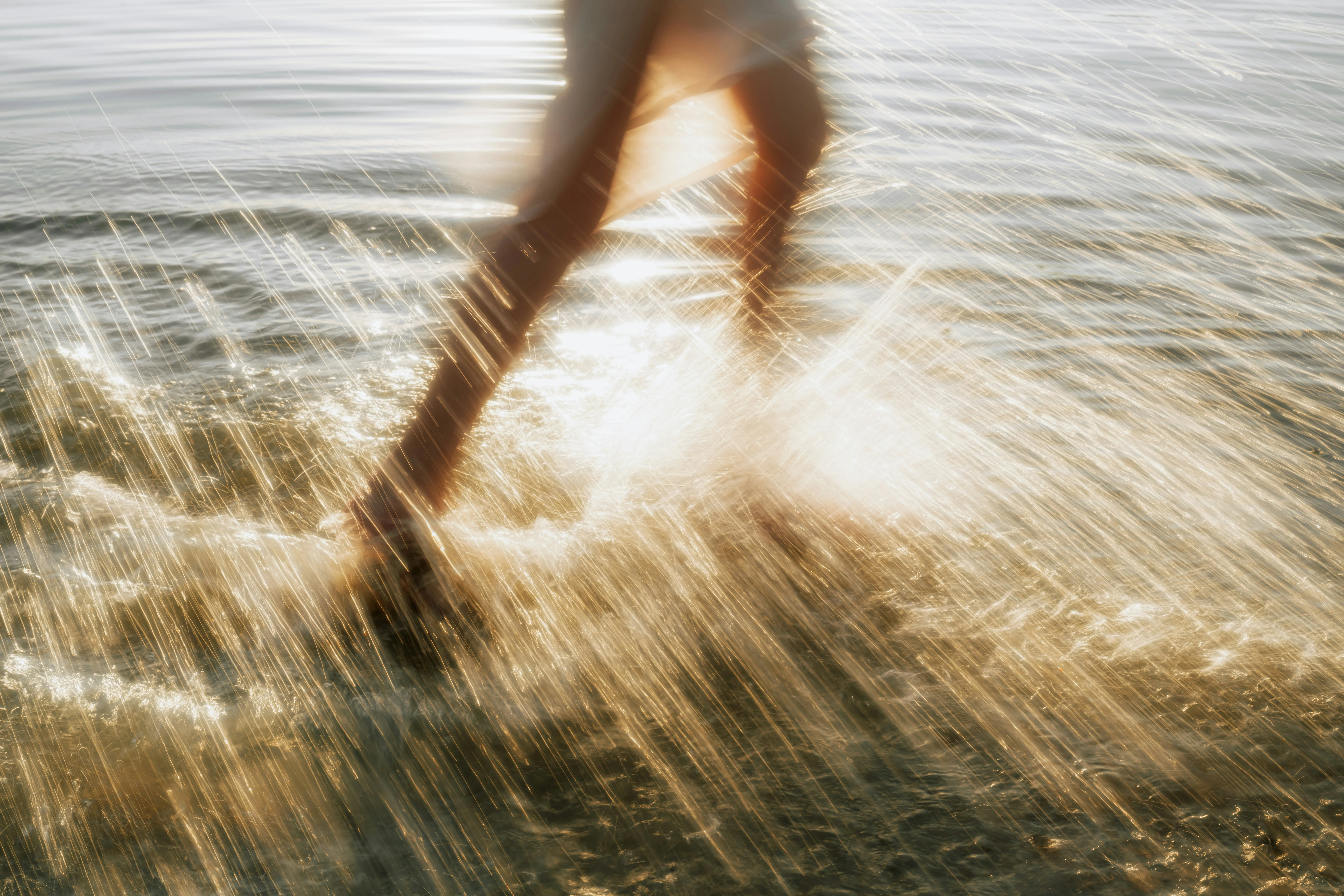 Splashing through the shallows at Cabarita